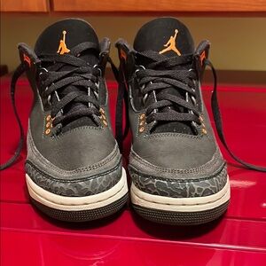 Jordan Black and Orange Sneakers